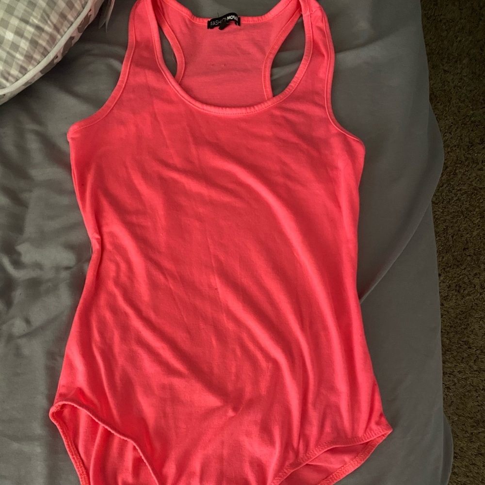 Neon pink tank body suit